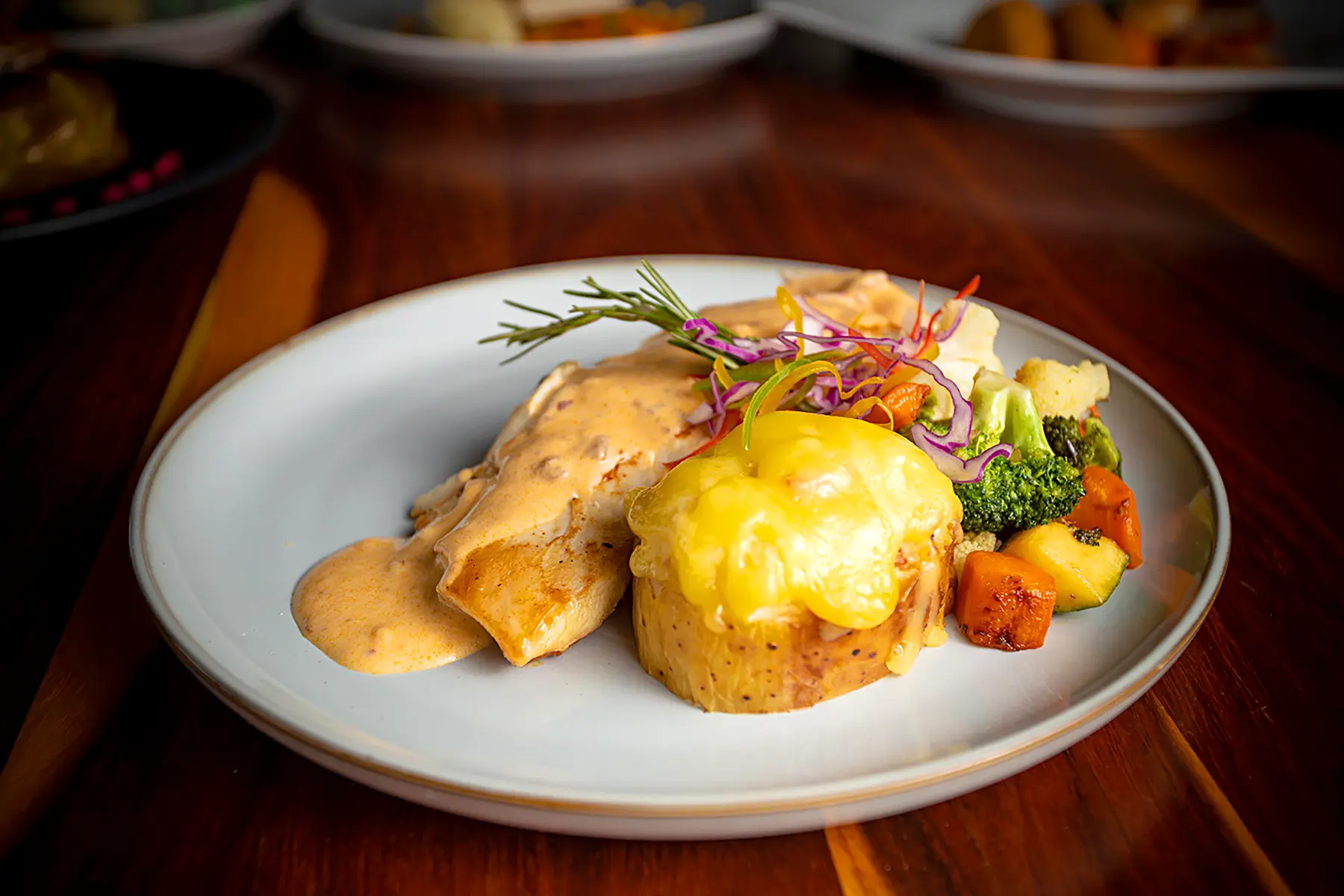 Potato, carrot, orange slices, duck cake in French specialty currant sauce from the Oceano Palace Mazatlán hotel